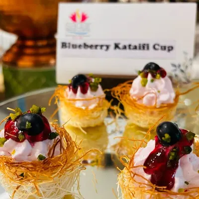 A twist on a Mediterranean classic, these are my Blueberry Kataifi Cups. The shredded pastry nests are filled with a light blueberry cream and topped with fresh fruit, offering a perfect balance of sweet and tart flavors.
