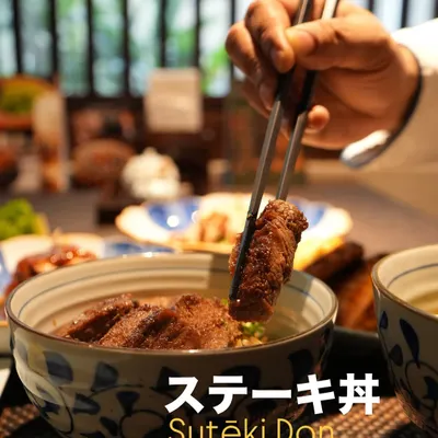 Introducing our Sutēki Don, or steak rice bowl. Juicy, grilled beef steak is sliced and served over a comforting bowl of fluffy Japanese rice for a bold and hearty meal.