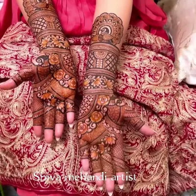 A design focused on beautiful, blooming roses that flow from the palms up the arm. The shading on the flowers gives them a realistic, three-dimensional look.