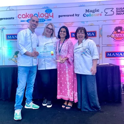 Receiving the first-place award for my sculpted cake at Cakeology. I am so grateful for these moments that celebrate the art of cake decorating.