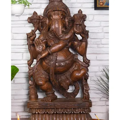 A 25-inch Mangalahara Ganapathi in a dynamic dancing pose, holding a lotus in his trunk. This form is considered highly auspicious for entrances and pooja rooms, bringing positive energy.