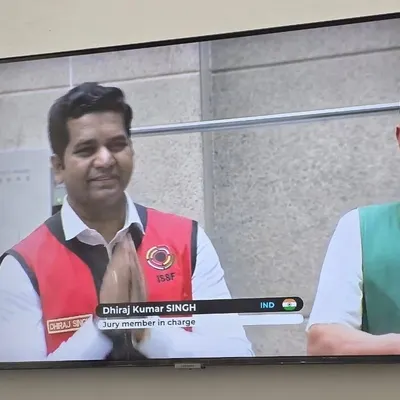 We are proud to have our Director, Mr. Dhiraj Singh, representing India as an International Jury member at the ISSF World Cup. This image captures him on screen during the event in Ningbo, China.