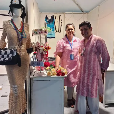 A wonderful moment captured at my exhibition stall with a lovely visitor. I feel so honored when people appreciate my handmade work and take the time to chat.