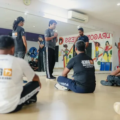 Our head instructor, Rhys Vaz, explains a core principle during a Third Party Protection seminar in Mangalore. We emphasize understanding the 'why' behind every technique.