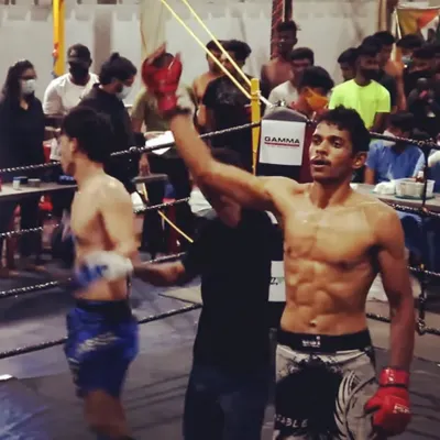 A throwback to my MMA fighting days. That feeling of having your hand raised in the ring is what all the hard work is for.