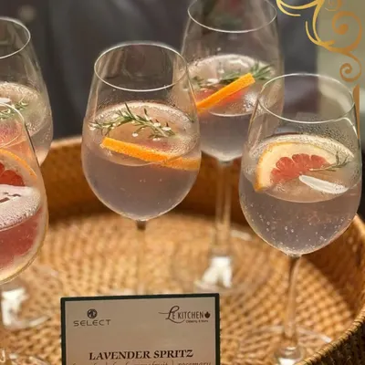 A truly great drink can set the tone for an entire evening. My Lavender Spritz, infused with fresh grapefruit and rosemary, is a signature cocktail designed to be both refreshing and elegant.