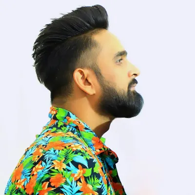 A profile shot that captures my modern and trendy style. I believe a DJ's look is part of the overall performance and experience.