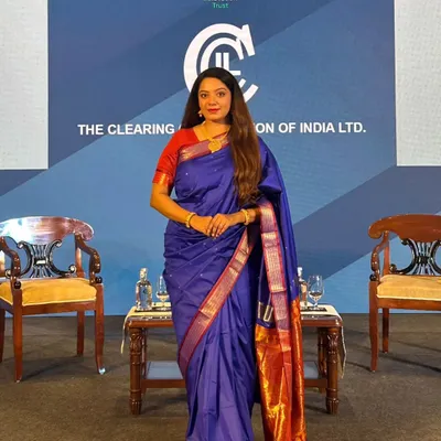 Posed shot on the stage set for the CCIL 25th-anniversary event. The setup included a formal seating arrangement for panel discussions with senior officials from the RBI and other financial institutions.