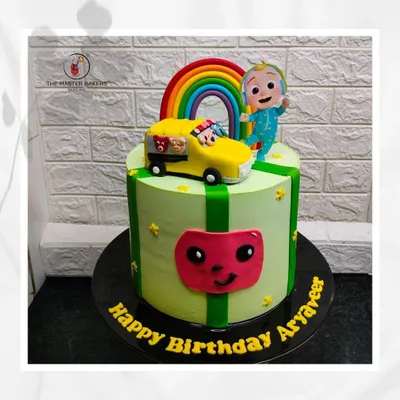 Here is a vibrant Cocomelon cake I made for Aryaveer's birthday. It features the iconic watermelon, a bright rainbow, and JJ on his school bus, bringing the fun of the show to the celebration.