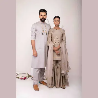 A studio catalogue shoot for a coordinated couple's collection. I created a polished look for the female model with a neat hair bun and defined eyes, and provided subtle grooming for the male model to ensure a cohesive, professional result.
