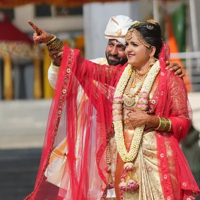 A beautiful candid moment from a traditional wedding. I provided makeup for both the bride and groom, ensuring they both looked their best for this unforgettable day.