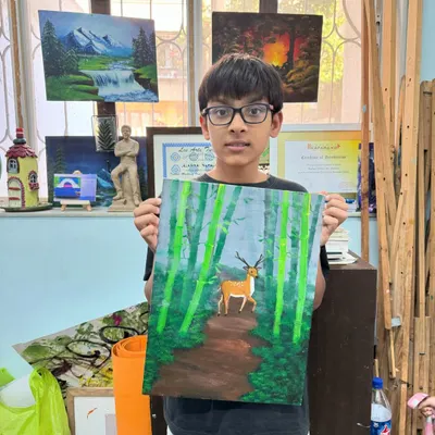 This peaceful forest scene was created using a special 'blur technique' on canvas. This method helps children learn about creating depth and atmosphere in their paintings.