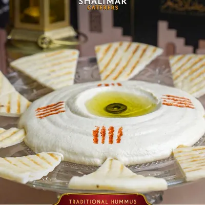 You deserve a premium feast after your fast. Our traditional hummus with warm pita bread is a perfect, nourishing start to your Iftar meal.