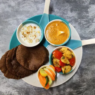 My special Navratri thali, prepared without onion or garlic. It includes Kuttu ki Puri, Vrat wale Aloo, and a creamy sabudana kheer for a complete fasting meal.
