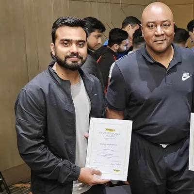 Receiving my Performance Training certification from the Technogym Wellness Institute, learning from master trainer Kyle Meadows.