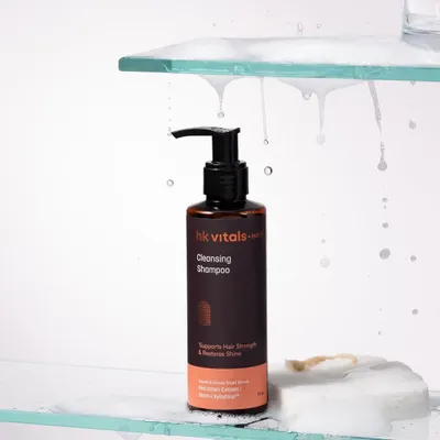 This shot is all about texture and the feeling of a refreshing lather. We used glass shelves and cascading soap suds to create a clean, bathroom-like environment that highlights the shampoo's cleansing power.