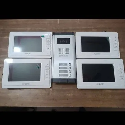 This is a multi-apartment video door phone system I installed. It includes one outdoor camera unit and four indoor monitors, allowing each flat to manage its own door security. I can handle installations for both single homes and large residential buildings.