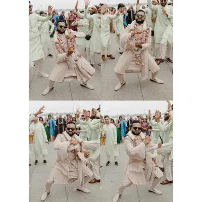 The groom's entrance should be full of energy and style. Here, Aakash dances with his groomsmen, all styled by us. His blush pink striped sherwani stands out beautifully against the groomsmen's coordinated mint green kurtas, creating a look that is both fun and fashionable for the Baraat.