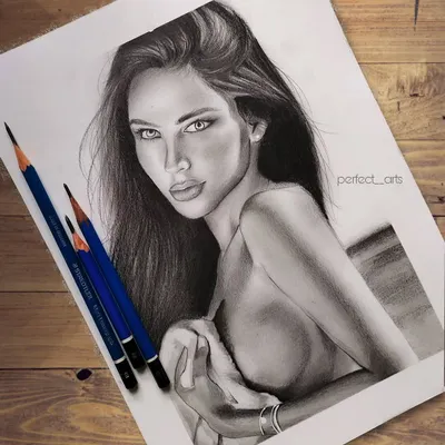 My take on a classic portrait of Angelina Jolie. The main goal here was to capture her distinct features and intense gaze using careful shading with graphite pencils to create a soft yet powerful look.