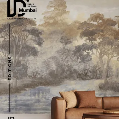 This Phillip Jeffries mural transforms a living room into a tranquil riverscape. The soft, painterly quality of the design creates a serene and immersive atmosphere, perfectly complementing the natural leather and earthy tones of the furniture.