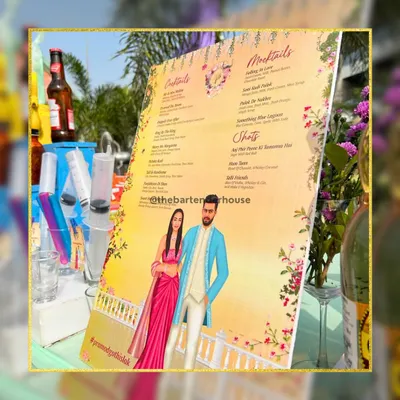A beautifully illustrated custom bar menu. We work with you to design menus that feature caricatures of the couple and names for cocktails that tell your story.