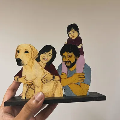 This custom wooden miniature features a full family, including their beloved golden retriever. It's a heartwarming, hand-painted piece that brings a digital illustration into the physical world.