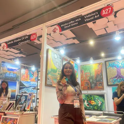 Me at my booth at 'The Haat of Art'. Being surrounded by my creations and fellow artists is an incredibly inspiring experience.