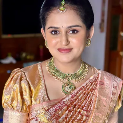 This look for Chandrika is the essence of my dewy skin style. The makeup is minimal and fresh, creating a radiant glow for her baby's naming ceremony.