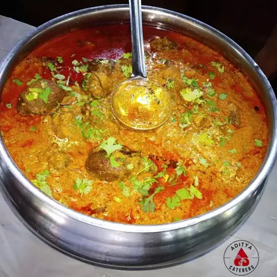 A taste of authentic Maharashtrian cuisine with our Baingan Masala. Small brinjals are stuffed with a coconut and spice mix and cooked in a rich, flavourful gravy, a specialty for traditional functions.