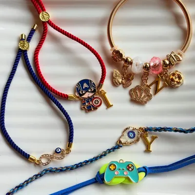 Celebrate the bond of siblinghood with our hand-curated Rakhis. We have a variety of designs, from quirky character rakhis for kids to elegant initial rakhis for adults.