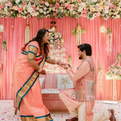 The big moment. Capturing the proposal during the ring ceremony, with flower petals showering down, is a memory to cherish forever.