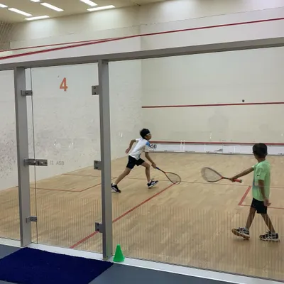 Intense action from the Willingdon Squash Academy tournament, where young players battled it out in fast-paced rallies.