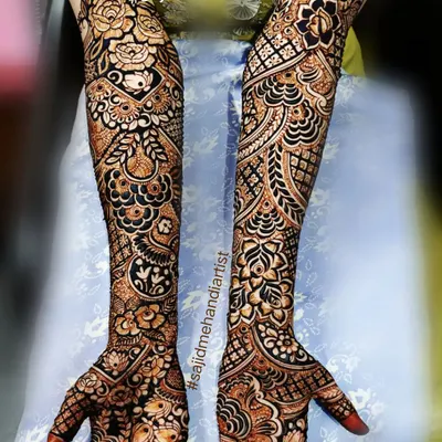This is the level of full bridal mehandi you can learn to create. I teach you how to compose and execute these highly intricate, full-arm designs, layering traditional patterns with bold, clean lines to achieve a stunning result for your clients.