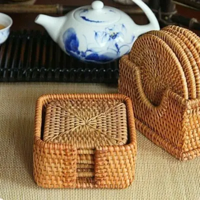 Our handcrafted cane coasters are the perfect blend of utility and rustic charm. Available in both square and round sets with a matching holder, they protect your surfaces while adding a touch of natural, sustainable design to your table.