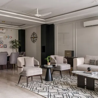 Inspired by clean Scandinavian design, we created this calm and neutral drawing room. The space features our custom-made sofa, armchairs, and a marble-top coffee table, all designed to create a harmonious and tranquil atmosphere.