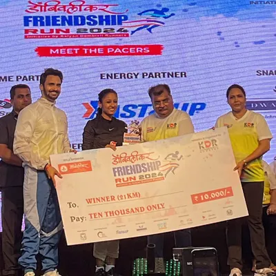 Securing first place in the Dombivali Friendship Run 21k. It's an amazing feeling to stand on the podium, holding the prize for a race well run.