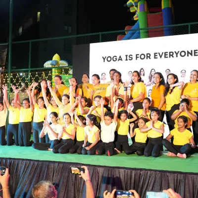 Glimpses from one of my best experiences, leading a large group of young yogis on stage. The banner says it all: "Yoga is for Everyone."
