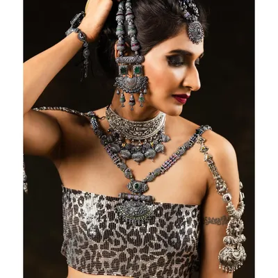 This look was for an oxidised silver jewellery campaign. I paired the heavy, tribal-inspired pieces with a dramatic black smokey eye and a deep red lip to create a fierce and powerful editorial look.