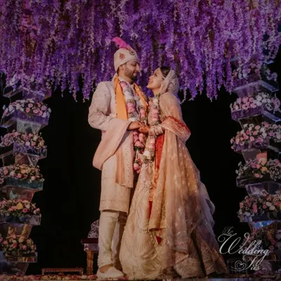 A mandap that feels like a purple dream. This setup at a Goa wedding features a stunning cascade of wisteria under which the couple exchanged their vows, showing my commitment to creating unique and romantic atmospheres.