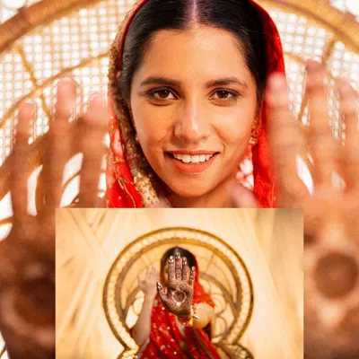 A creative "picture-in-picture" shot focusing on the bride's intricate henna design. This highlights our artistic approach to detail photography.