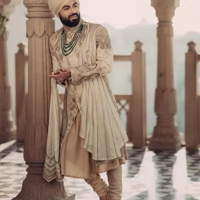 A portrait of groom Bismil looking effortlessly royal in his ivory sherwani by Sulakshana Monga. I added a multi-layered emerald necklace to bring a touch of color and grandeur.