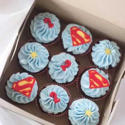 It's a bird, it's a plane, it's Superman cupcakes! These were for a superhero-themed birthday party, complete with the iconic 'S' logo and little number '2' toppers. These are always a huge hit with the kids.