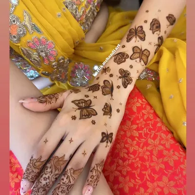 A beautiful and modern design featuring a flight of butterflies up the arm. This style is light, elegant, and perfect for someone wanting a non-traditional look.