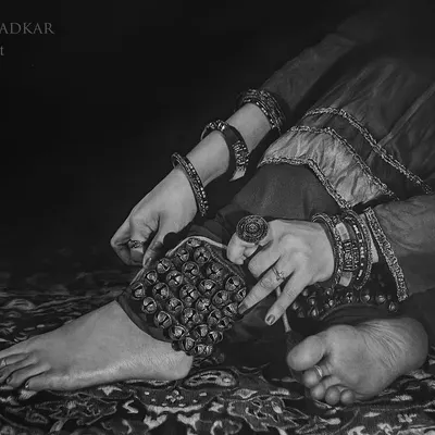 Titled 'Riwayat', this piece is my homage to the Ghungroo, an essential part of Indian classical dance. This wide-format drawing captures the moment a dancer prepares, highlighting the tradition and the connection to the earth.