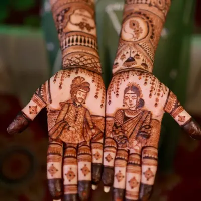 A perfect example of my couple portrait work. I capture the likeness of the bride and groom in traditional wedding attire, making your mehndi truly personal and a centerpiece of your wedding look.