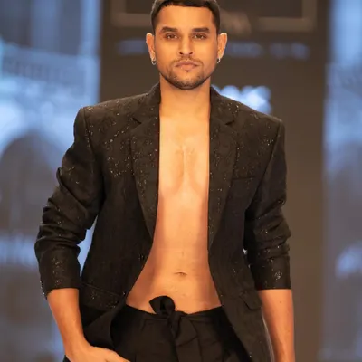Male grooming for The Luxo Show. This look is clean and sharp, with a focus on flawless skin and defined brows to create a strong presence on the runway.