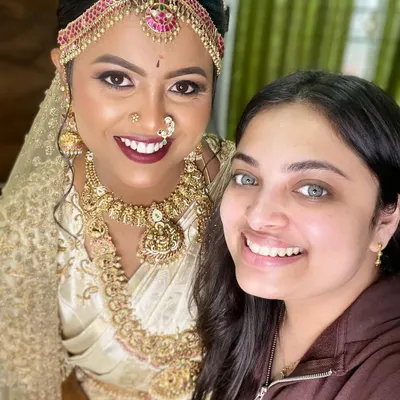 A happy selfie with my own makeup artist for my wedding day. It was a joy to be on the other side of the brush and collaborate on my final look.