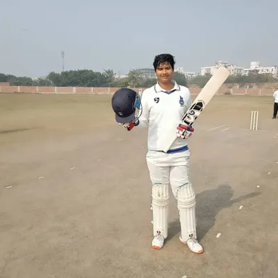 Celebrating a milestone achievement. Our trainee Sumit Kumar raises his bat after scoring a magnificent century (110 runs), a proud moment that showcases the quality of our batting coaching.