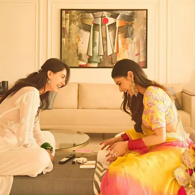 We are honored to see our artwork in the beautiful home of actress Mouni Roy and Suraj Nambiar, seen here with actress Disha Patani. The abstract painting provides a sophisticated and contemporary backdrop for their special moments.