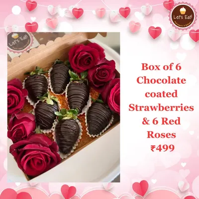 The ultimate romantic gift: a box of six juicy strawberries hand-dipped in rich chocolate, nestled alongside six fresh red roses.
